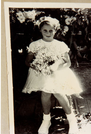 Copy of a photograph of June Jacobs dressed as a Queens attendant